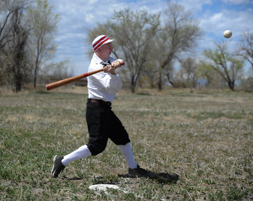 Andrew "Smiles" Pfriem of Denver, playing for the Colorado Springs/ Denver & Rio Grande Railroad team, readies his swing during a Colorado Vintage Base Ball Association game at South Platte Historical Park May 7.